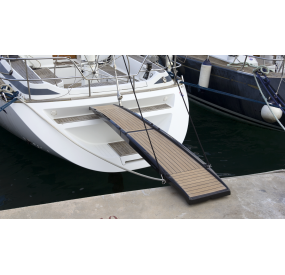 Carbon fiber finish gangway with teak wood walking surface on 50 feet sailing yacht